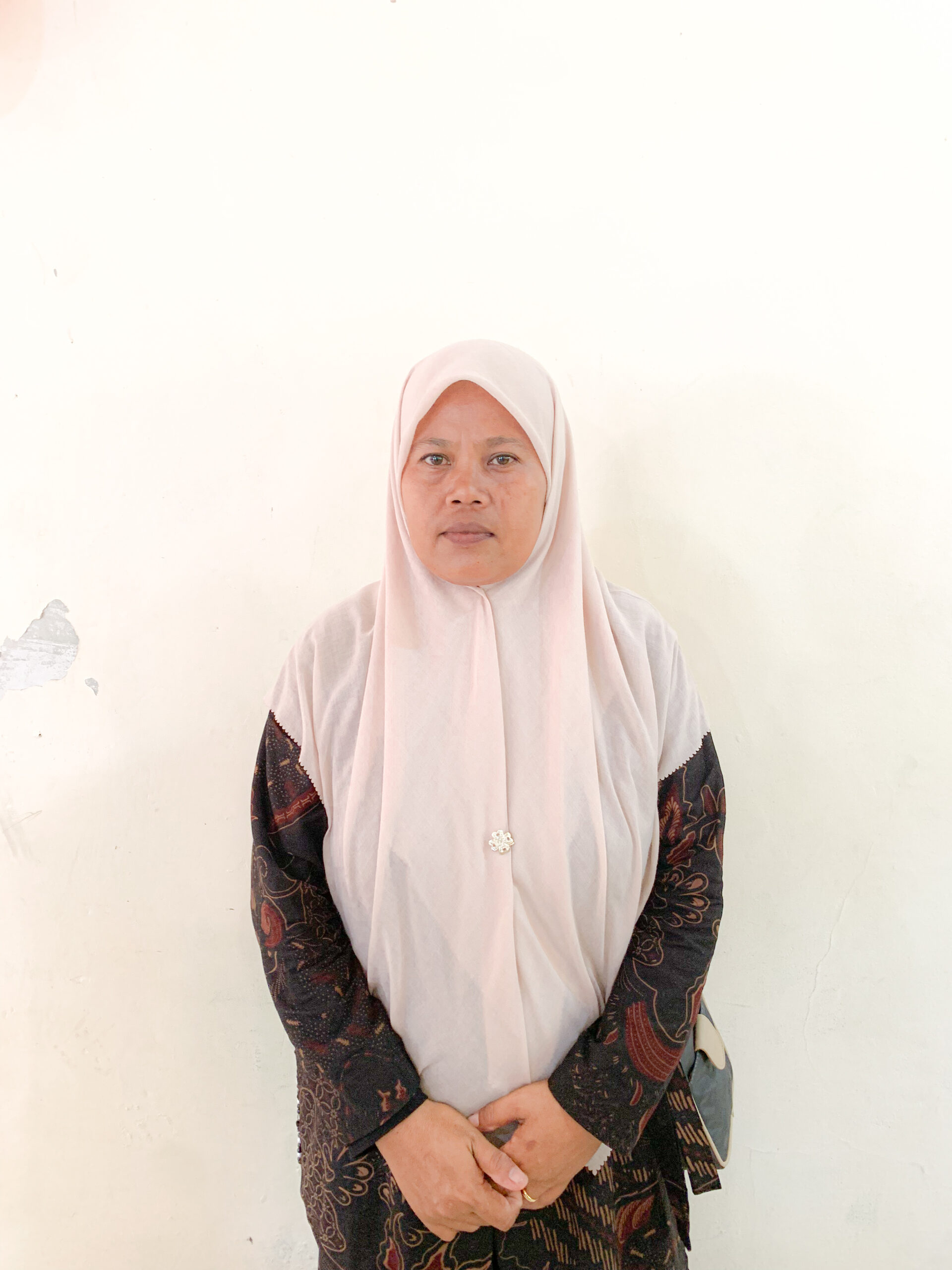 Ny. UMI SANGADAH